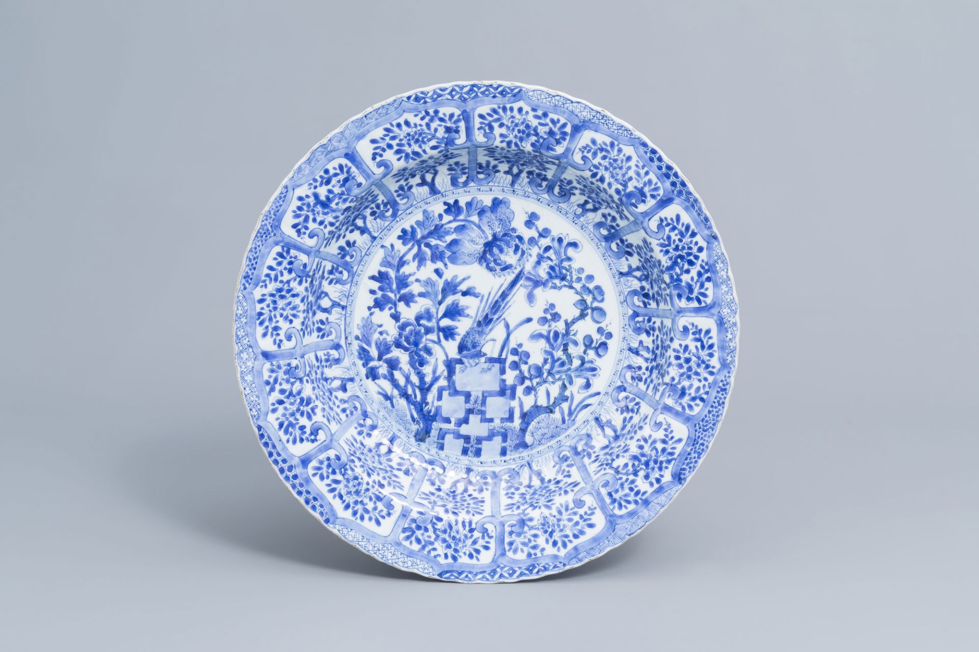 A pair of Chinese blue and white 'pheasant' chargers, Kangxi - Image 4 of 8