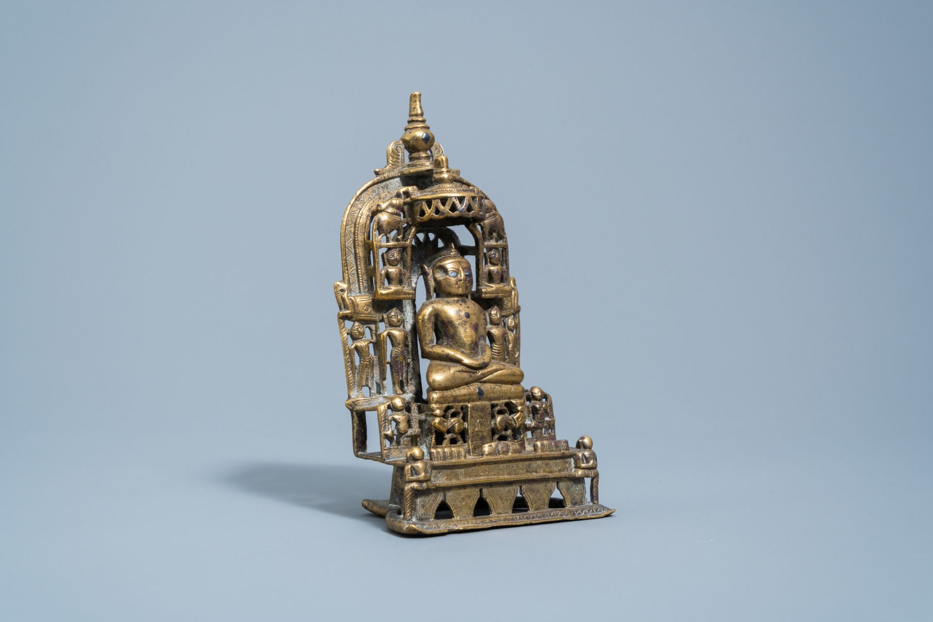 An Indian silver inlaid and inscribed bronze Jain shrine, 19th C. or older