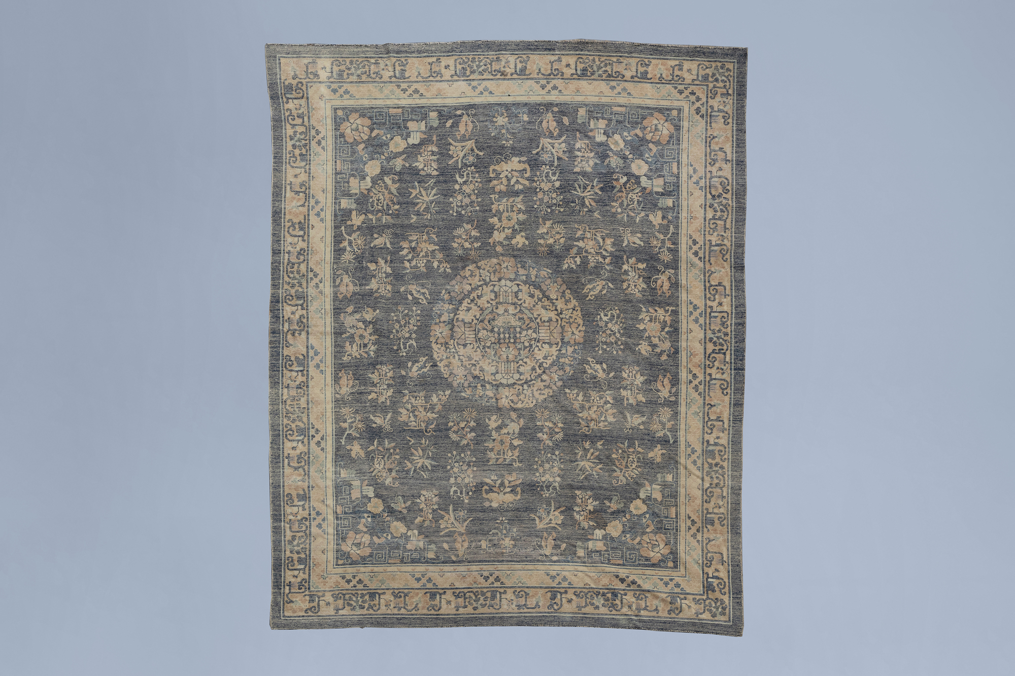 A Chinese Baotou rug with floral design, wool on cotton, first half of the 20th C. - Image 2 of 3