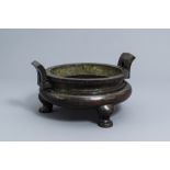 A large Chinese lacquered bronze censer with inscribed base, Yuan/Ming