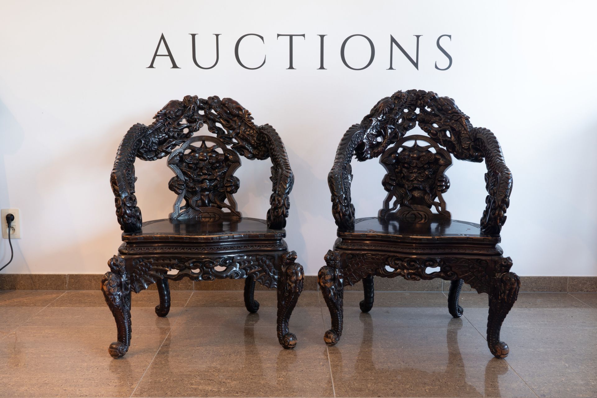 A pair of Chinese or Japanese carved wooden 'dragon' chairs, 19th/20th C. - Image 3 of 8