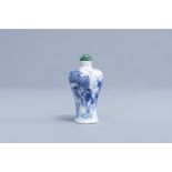 A Chinese blue and white snuff bottle with soldiers near a fortress, 19th C