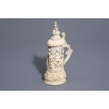 A German ivory mug and cover or tankard with a mythological 'Bacchanalia' scene, second half 19th C.