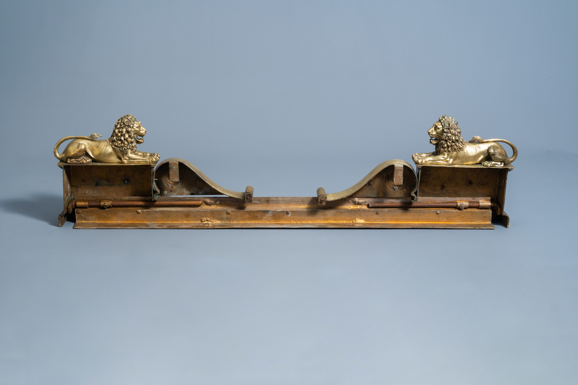 A pair of French Neoclassical patinated and gilt bronze andirons with a lion, 19th C. - Image 2 of 2