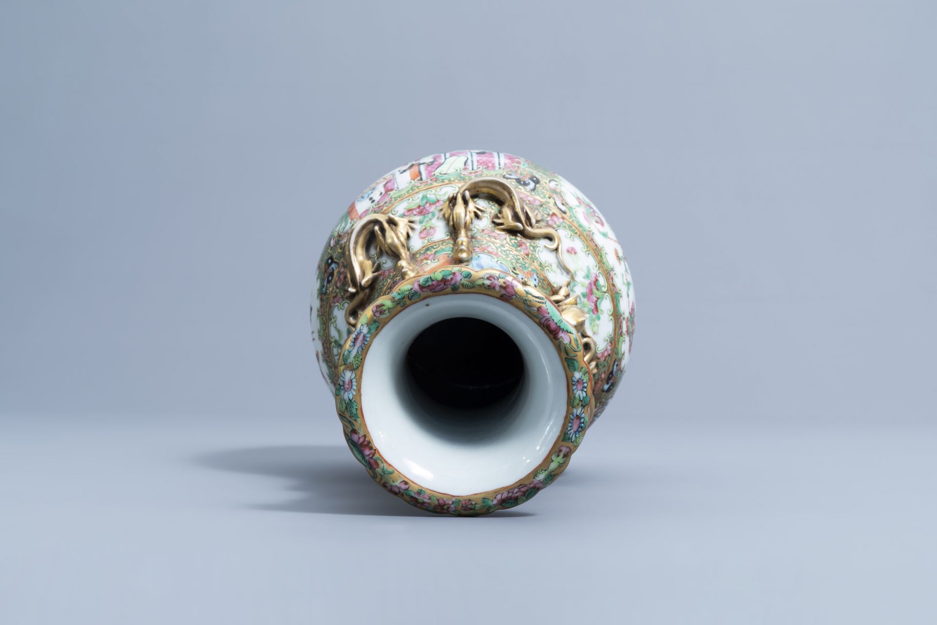 A Chinese Canton famille rose relief decorated 'dragons' bottle vase, 19th C. - Image 5 of 6