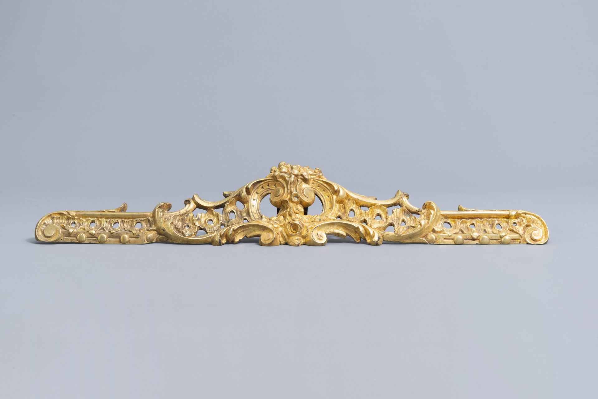 A pair of French Louis XV style patinated and gilt bronze andirons with putti, 19th C. - Image 8 of 15