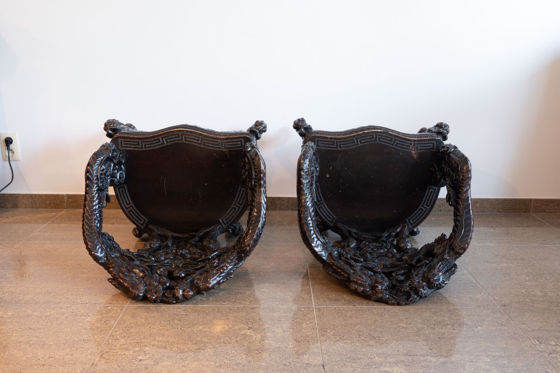 A pair of Chinese or Japanese carved wooden 'dragon' chairs, 19th/20th C. - Image 8 of 8