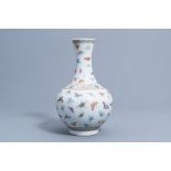 A Chinese famille rose '100 butterflies' bottle vase, Guangxu mark, 20th C.