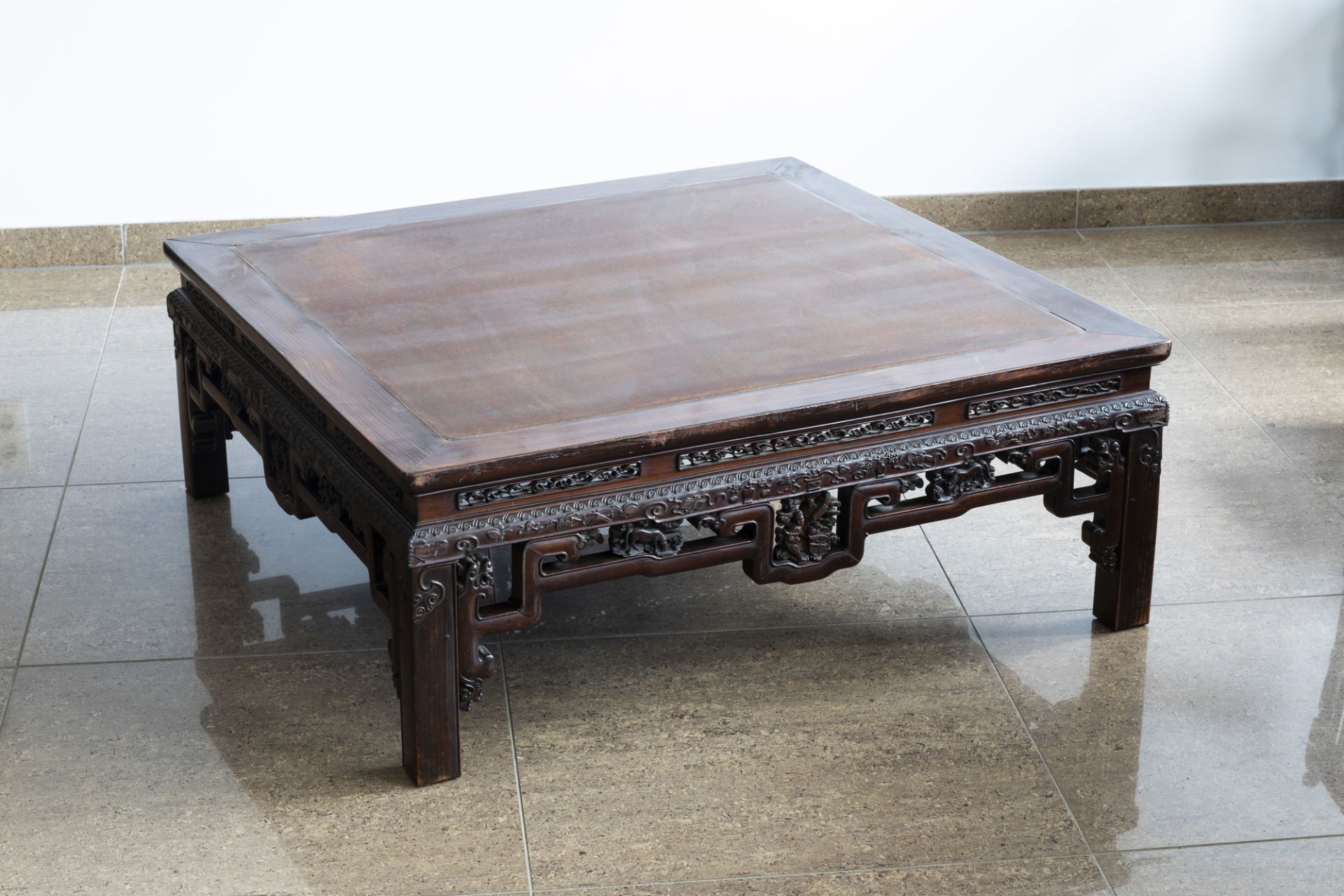 An rectangular Chinese carved wooden coffee table with glass top, 19th/20th C. - Image 6 of 9