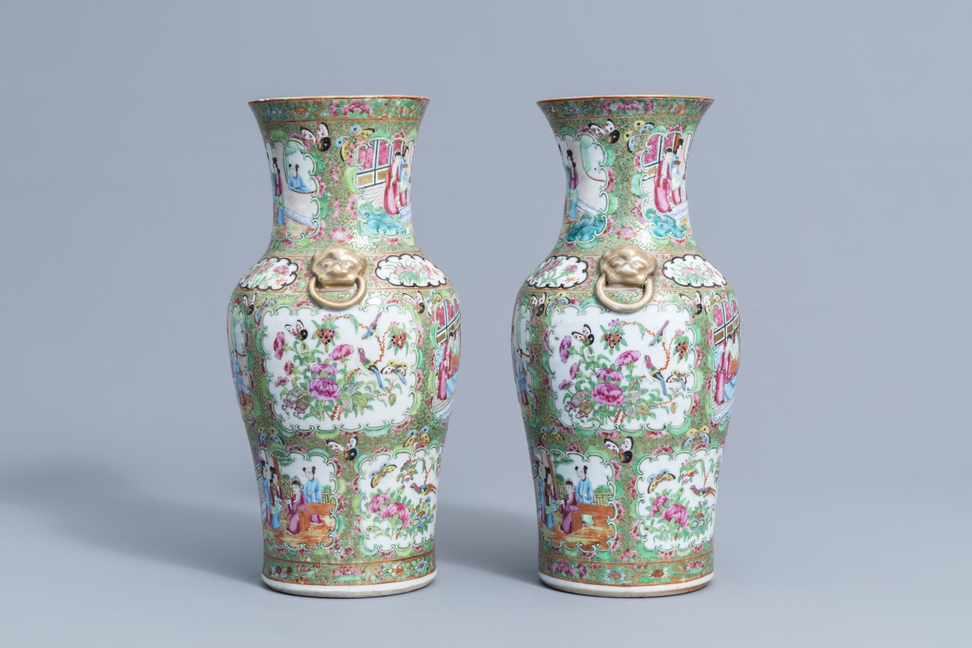 A pair of Chinese Canton famille rose baluster vases, 19th C. - Image 4 of 6