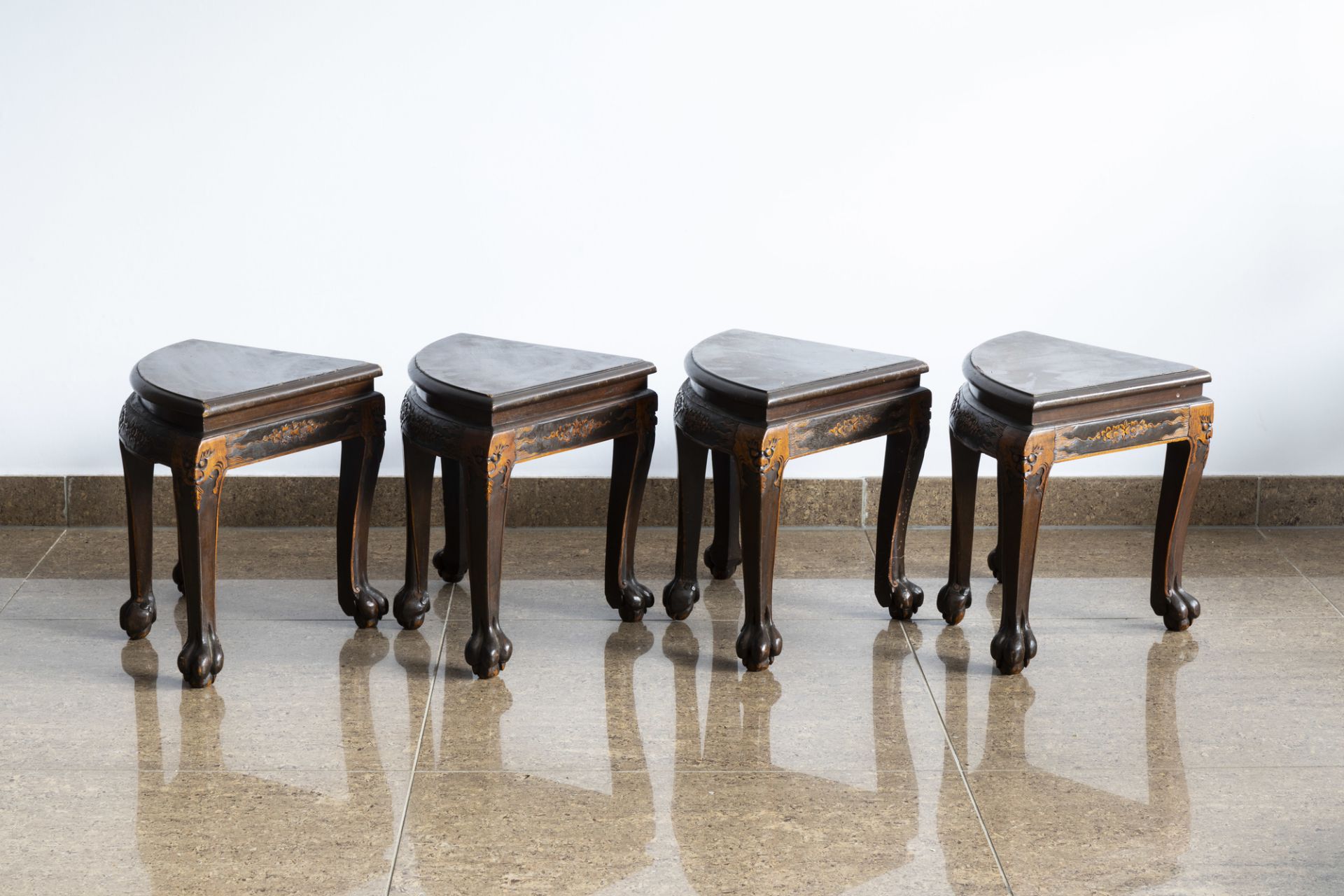 A Chinese wooden coffee table and four stools with relief design, 20th C. - Image 10 of 13