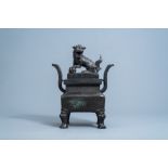 A large Chinese bronze censer and cover, Ming