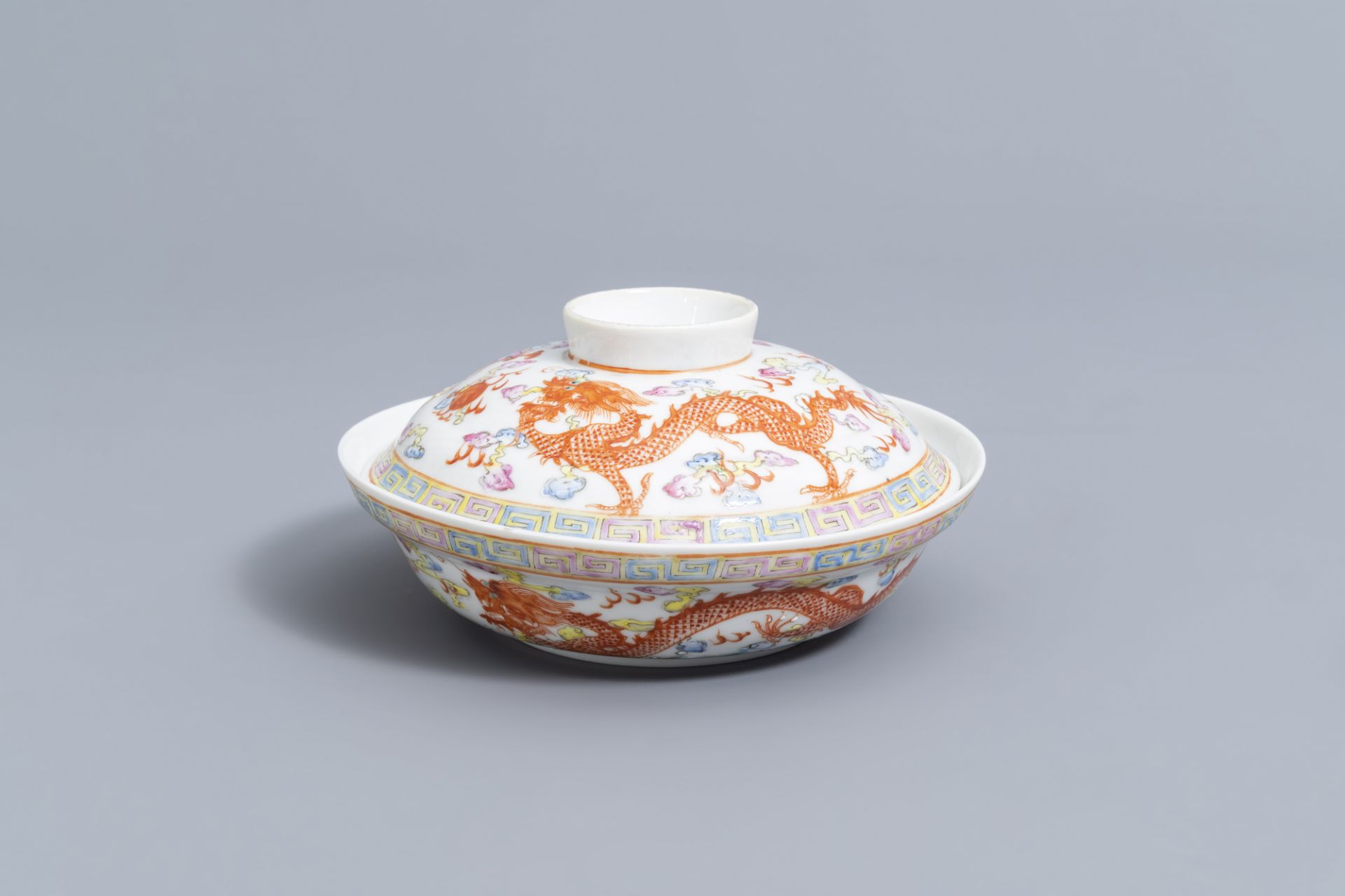 A Chinese famille rose 'dragons and phoenix' bowl and cover, Jingdezhen mark, 20th C.