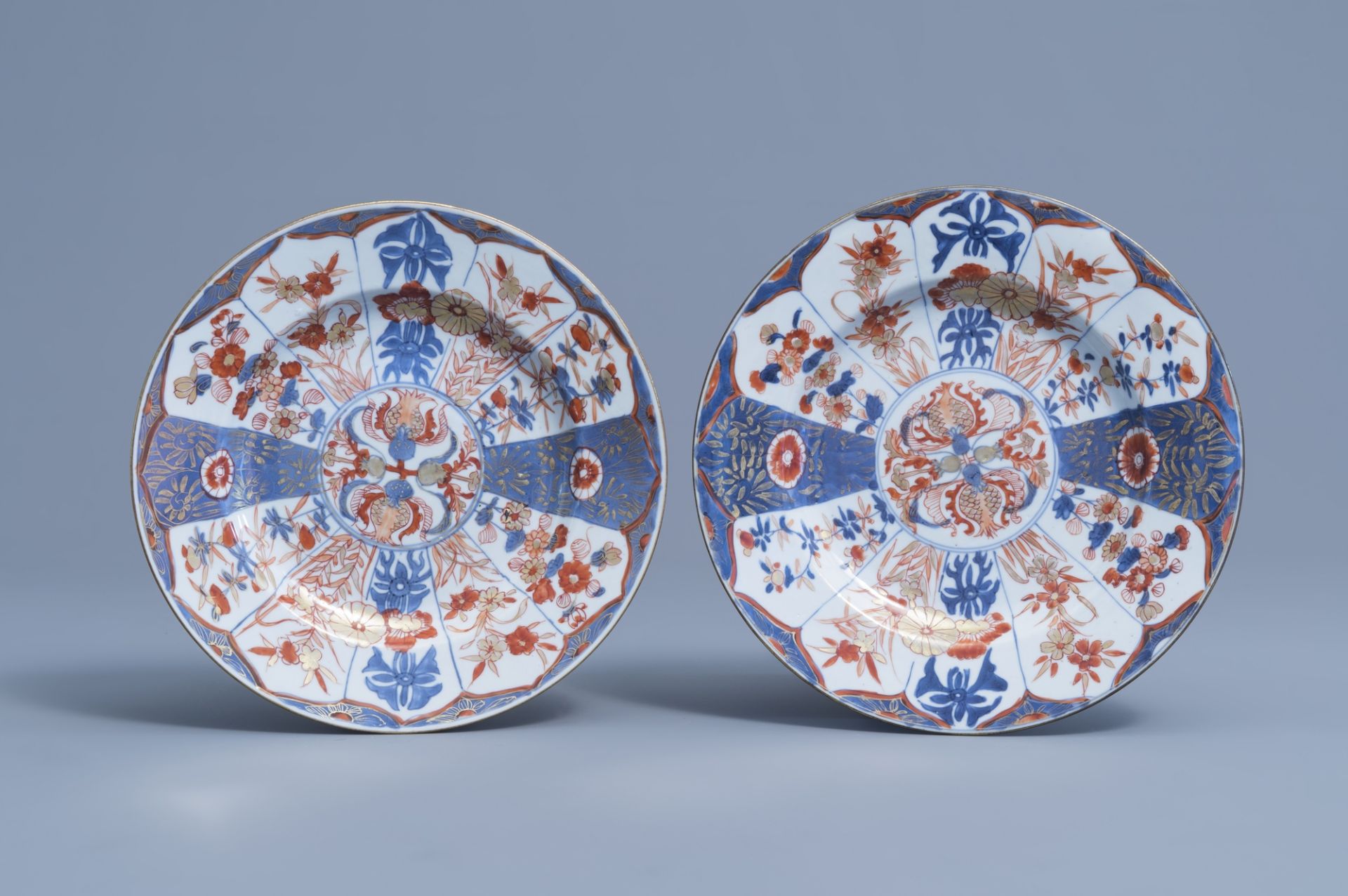 A pair of Chinese Imari style plates with floral design, Kangxi