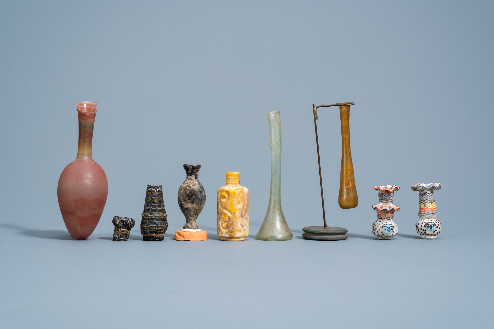 A varied collection of glass bottles and flasks, possibly Roman - Image 3 of 5