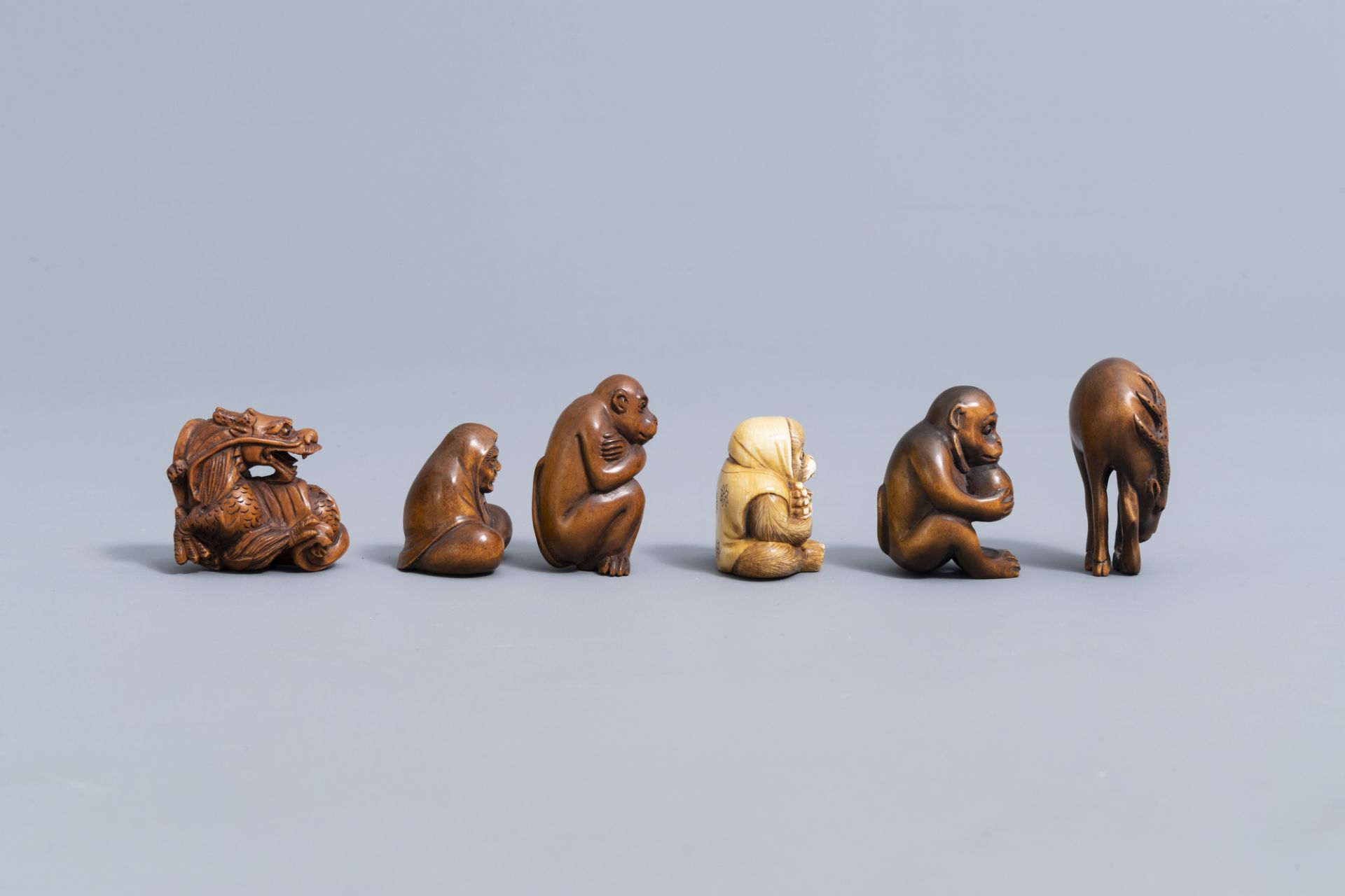 Seven various Japanese ivory and wood netsuke, three Chinese wood figures and a miniature skull, 20t - Image 3 of 13