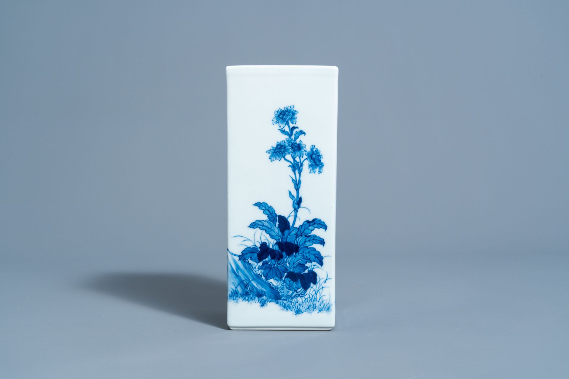 A square Chinese blue and white brush pot with floral design, marked, 20th C. - Image 2 of 7