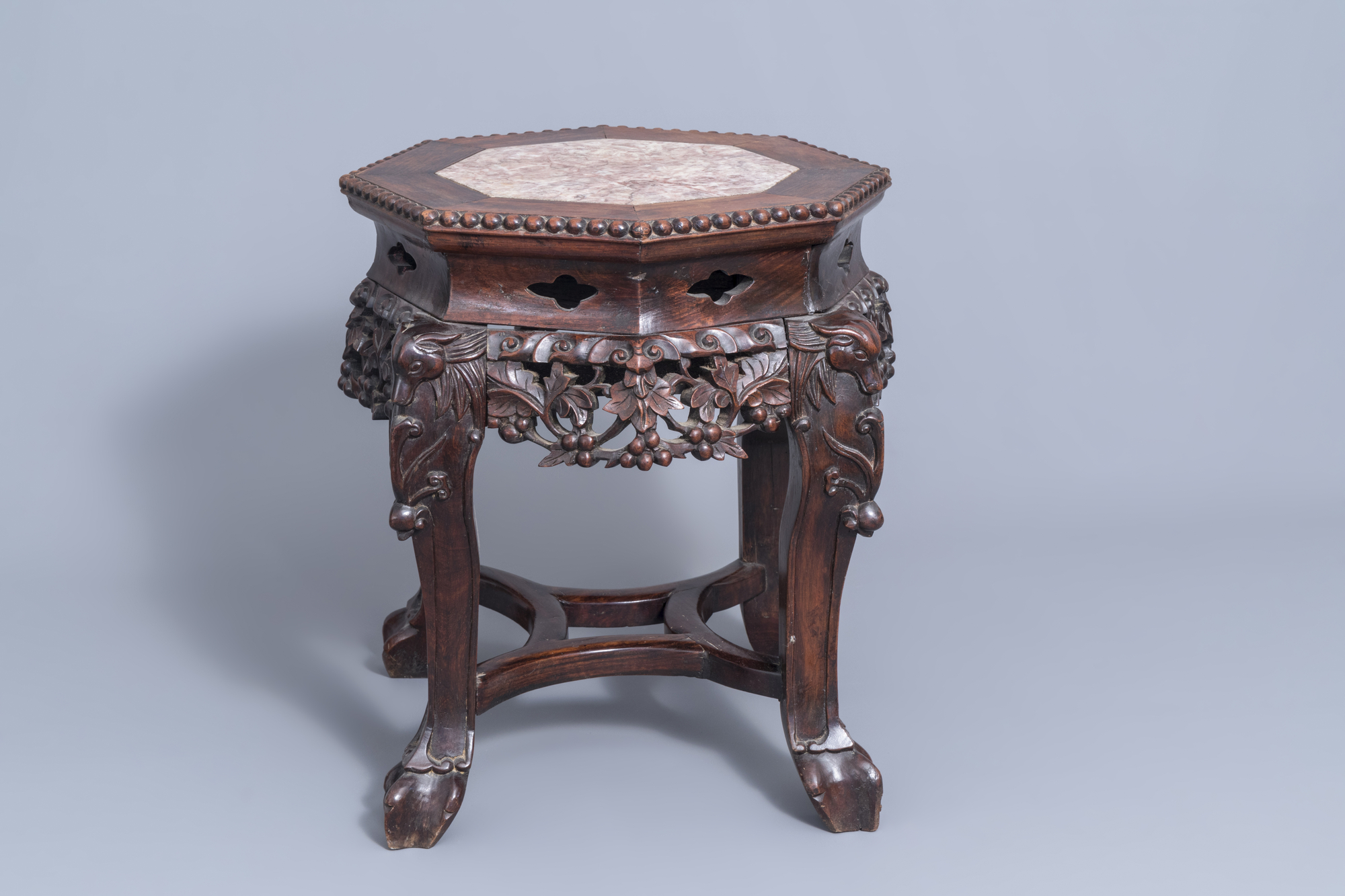 A collection of Chinese wooden stands and a carved wooden stand with marble top, 19th/20th C. - Image 10 of 14