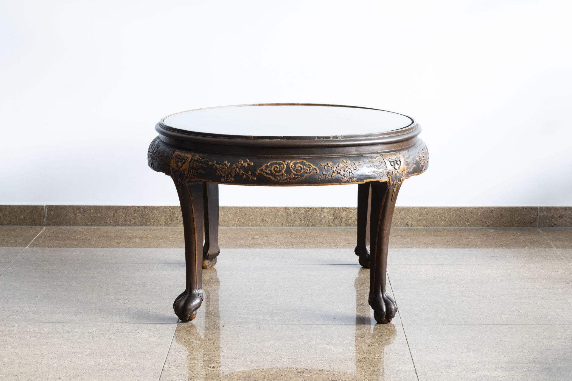 A Chinese wooden coffee table and four stools with relief design, 20th C. - Image 4 of 13