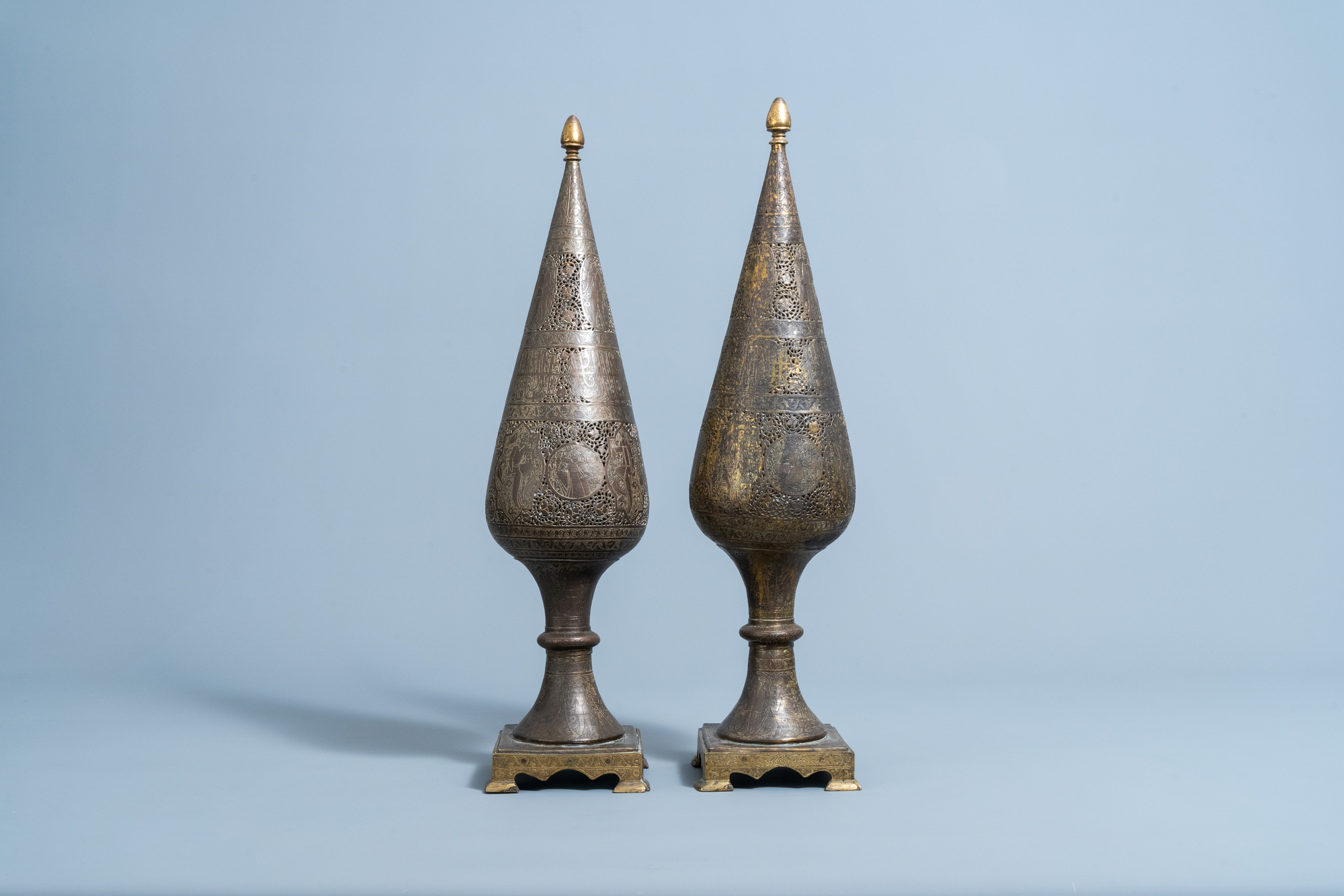 A pair of reticulated gilt bronze cone shaped ornaments with figures and calligraphy, Qajar, Iran, 1 - Image 2 of 7