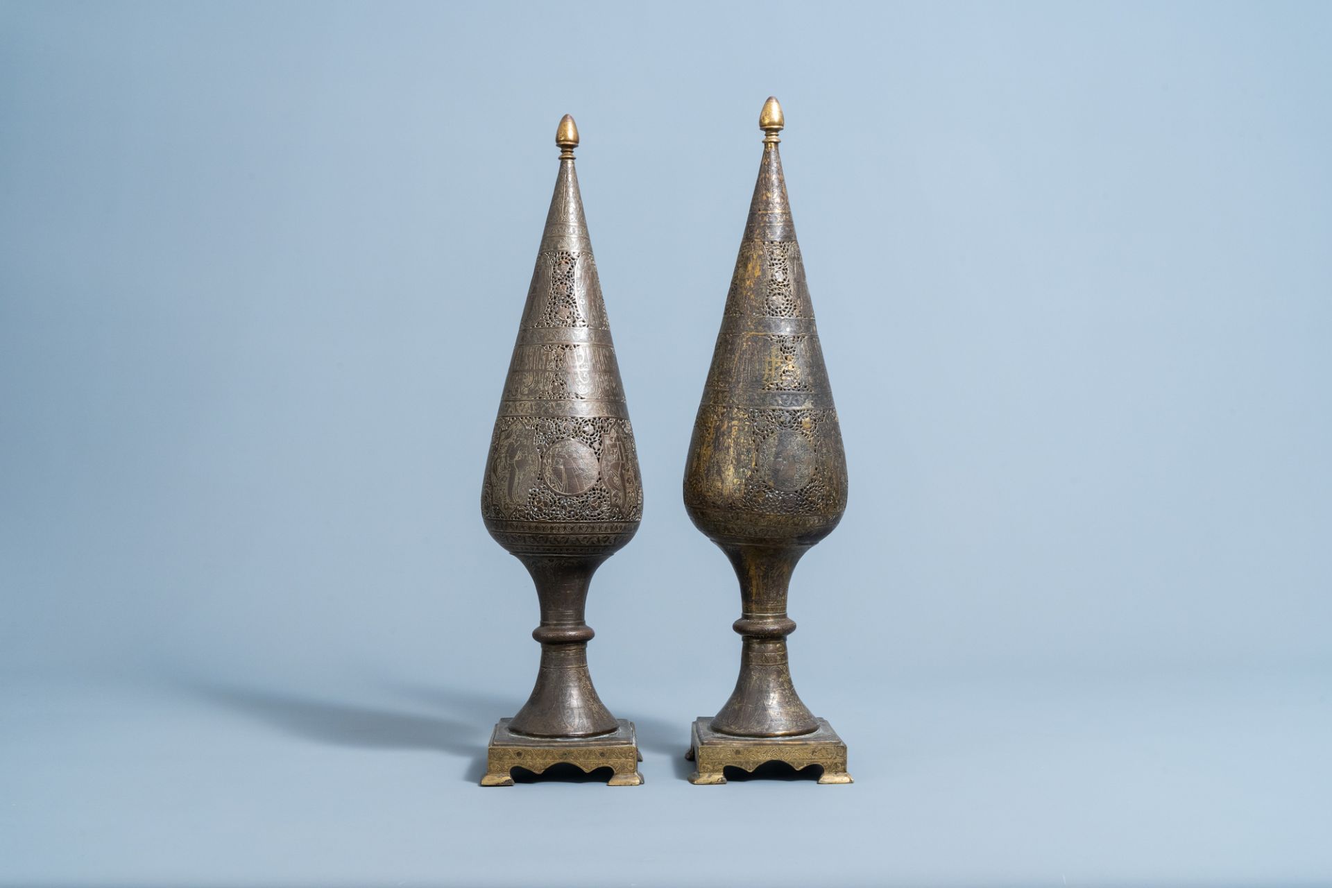 A pair of reticulated gilt bronze cone shaped ornaments with figures and calligraphy, Qajar, Iran, 1 - Image 2 of 7