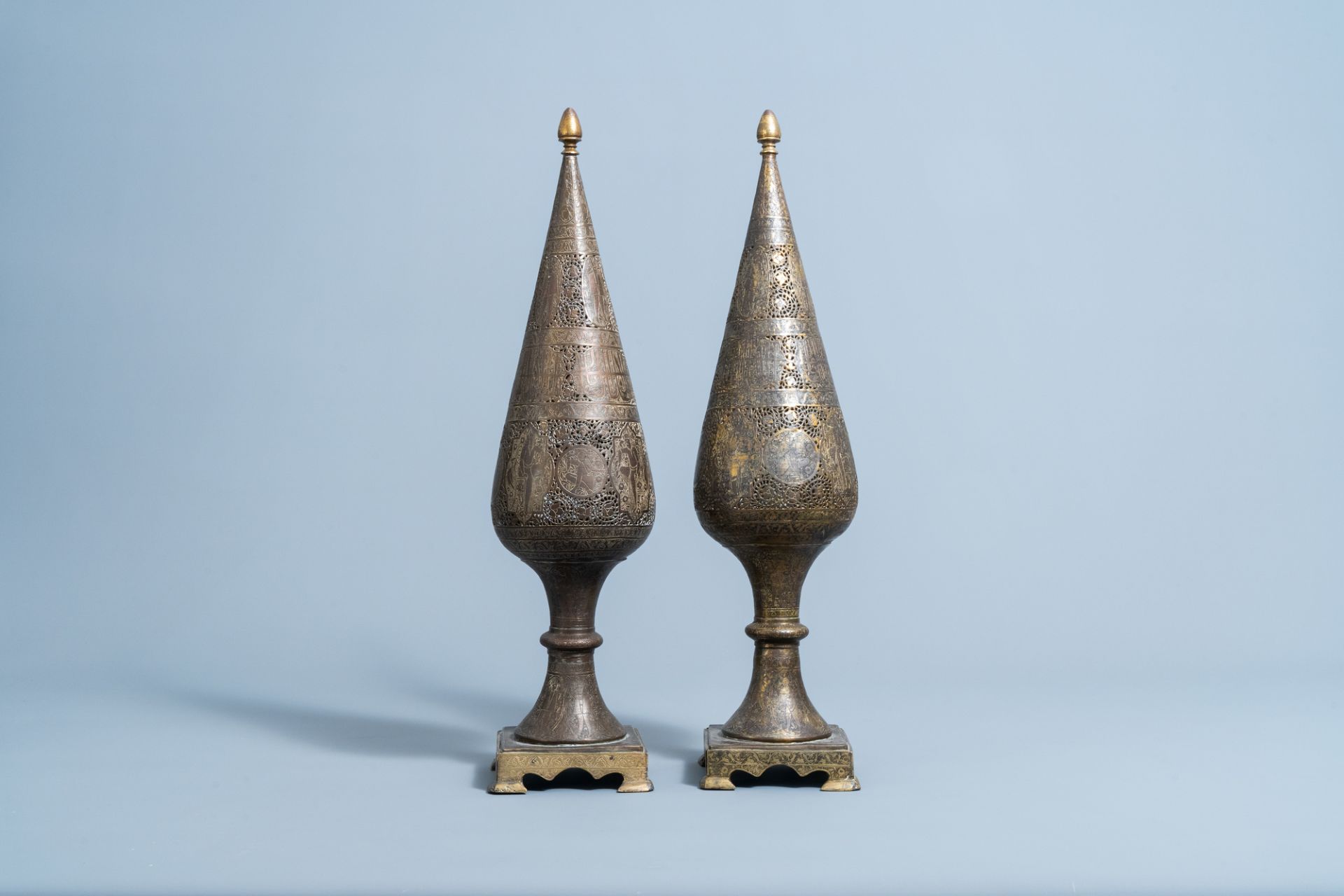 A pair of reticulated gilt bronze cone shaped ornaments with figures and calligraphy, Qajar, Iran, 1 - Image 4 of 7