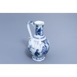 A Dutch Delft blue and white chinoiserie jug, 17th C.