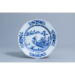 A Chinese blue and white octagonal charger with an animated river landscape, Qianlong