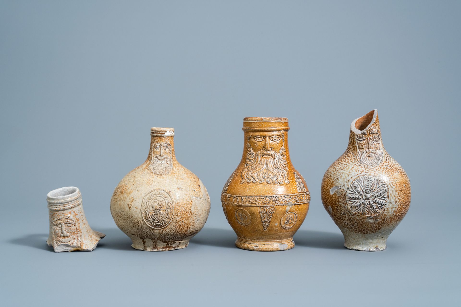 Three German stoneware bellarmine jugs and a neck fragment, 16th/17th C. - Image 2 of 8