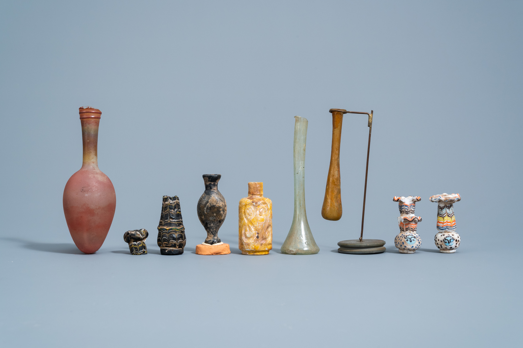 A varied collection of glass bottles and flasks, possibly Roman - Image 2 of 5