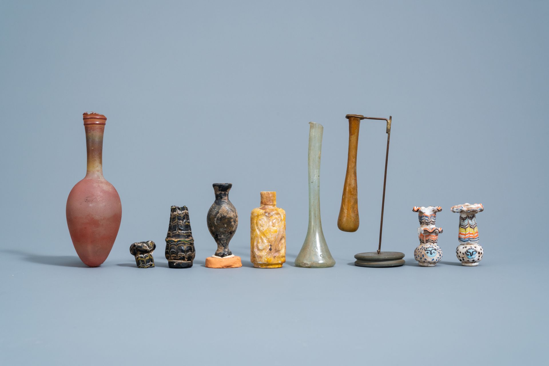 A varied collection of glass bottles and flasks, possibly Roman - Image 2 of 5