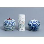 A Chinese famille rose hat stand with ladies in & two blue & white celadon jars & covers, 19th/20th