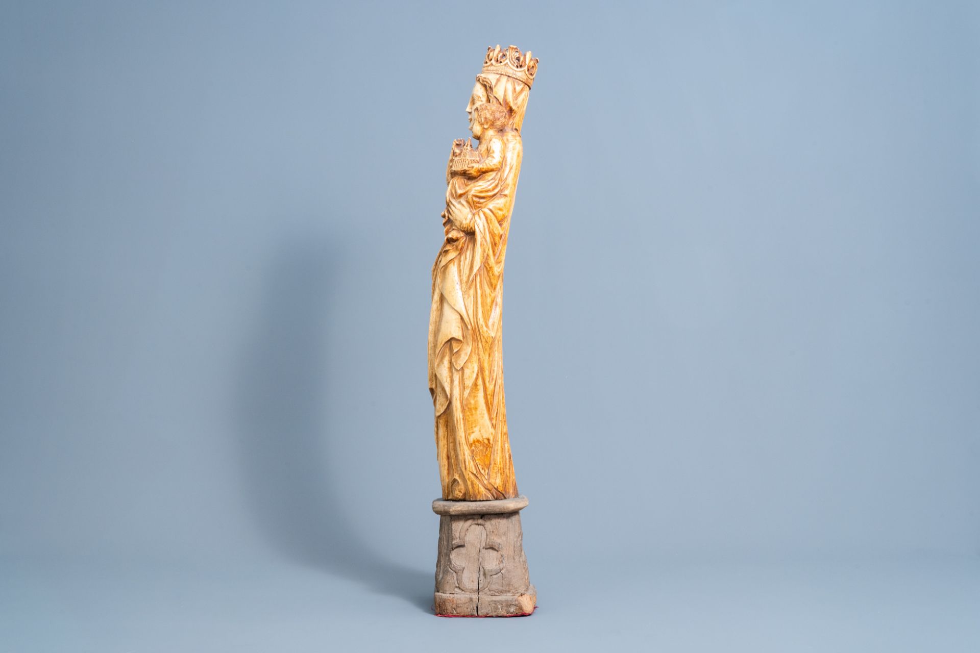 A French Gothic revival carved ivory group of Madonna and Child on an oak wooden base, probably atel - Image 2 of 6