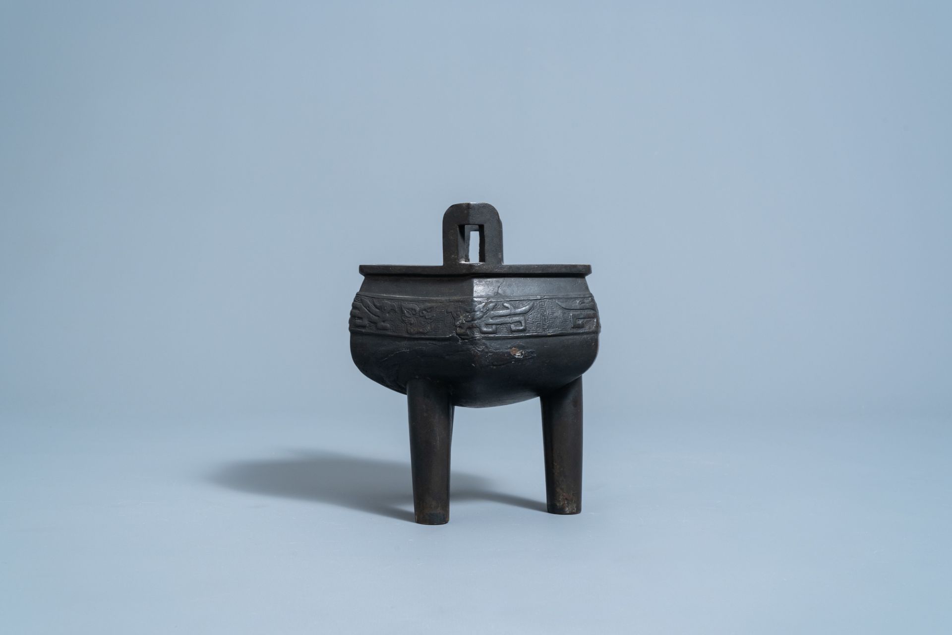 A Chinese bronze tripod censer with wooden cover and stand, Ming - Image 3 of 7