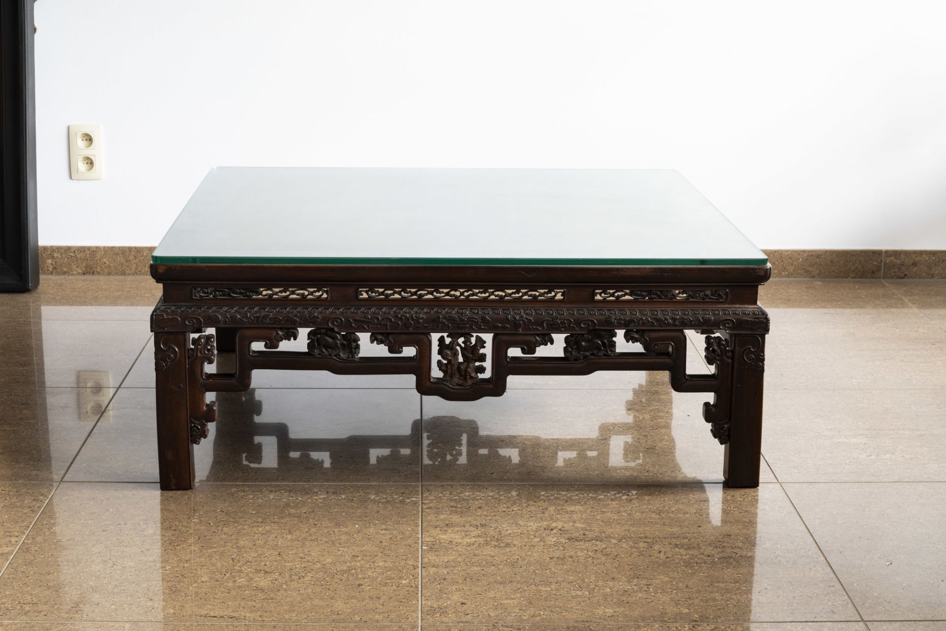 An rectangular Chinese carved wooden coffee table with glass top, 19th/20th C. - Image 3 of 9