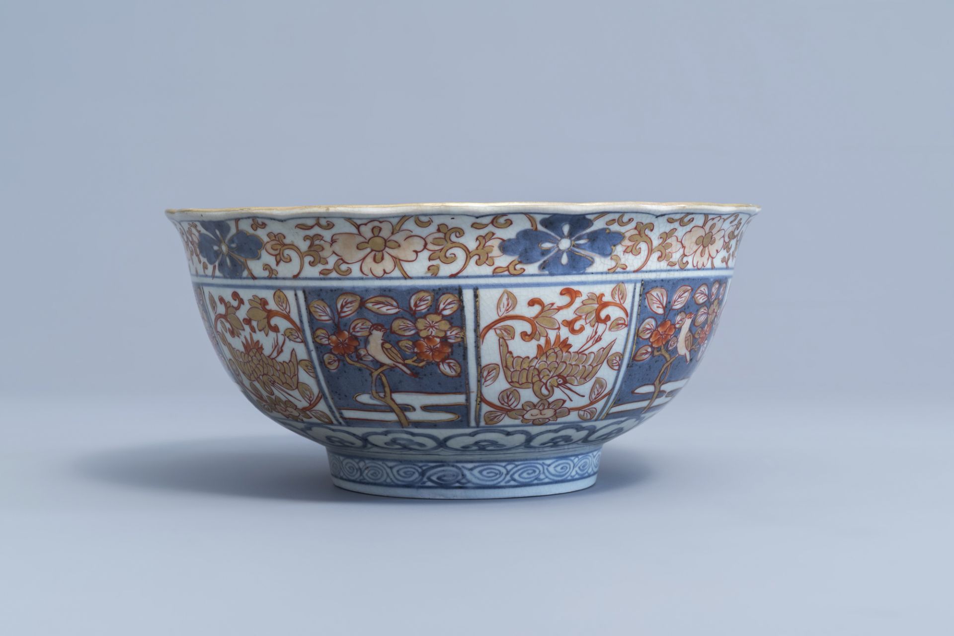 A Japanese Imari bowl with birds among blossoming branches and figures, Edo, 18th C. - Image 5 of 7