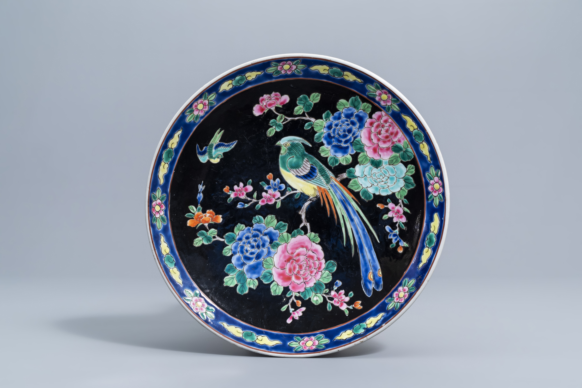 A varied collection of Chinese and Japanese blue, white, famille rose and Imari porcelain and a cloi - Image 8 of 9
