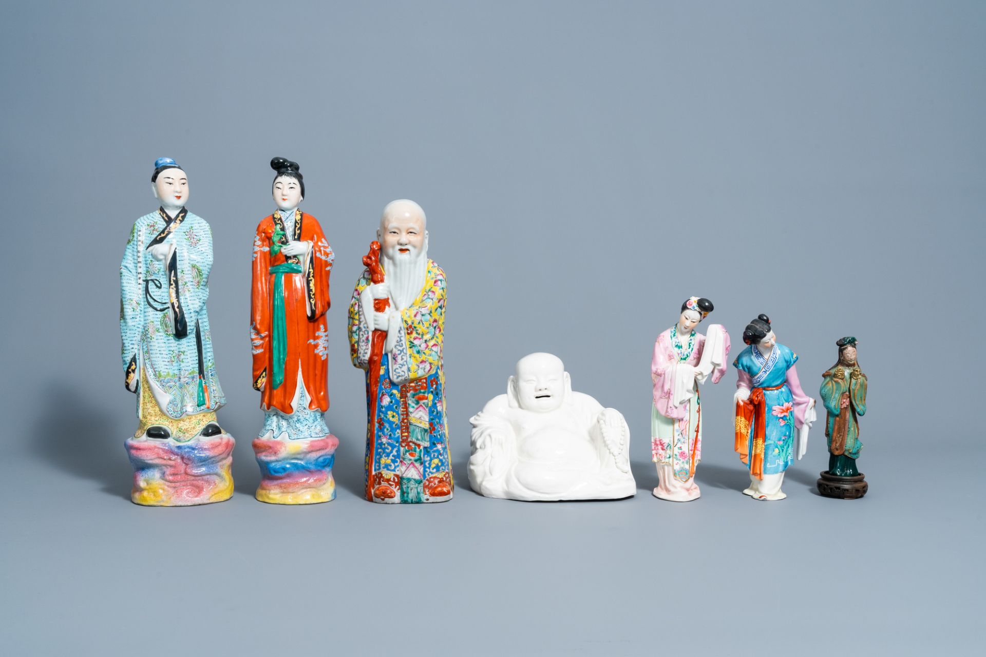 Six various Chinese famille rose and blanc de Chine figures and an earthenware lady, 20th C. - Image 2 of 7