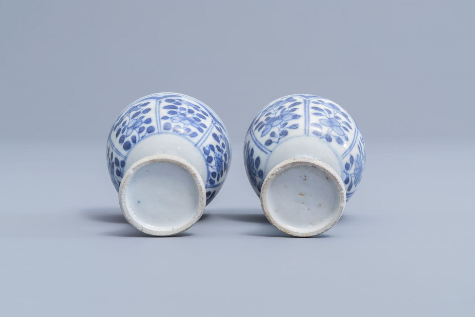 A pair of Chinese blue and white stem cups with floral design and a four-lobed teapot stand, Kangxi - Image 9 of 9