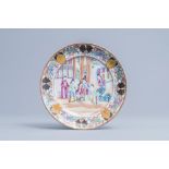 A Chinese Canton famille rose plate with a court scene and auspicious symbols, 19th C.