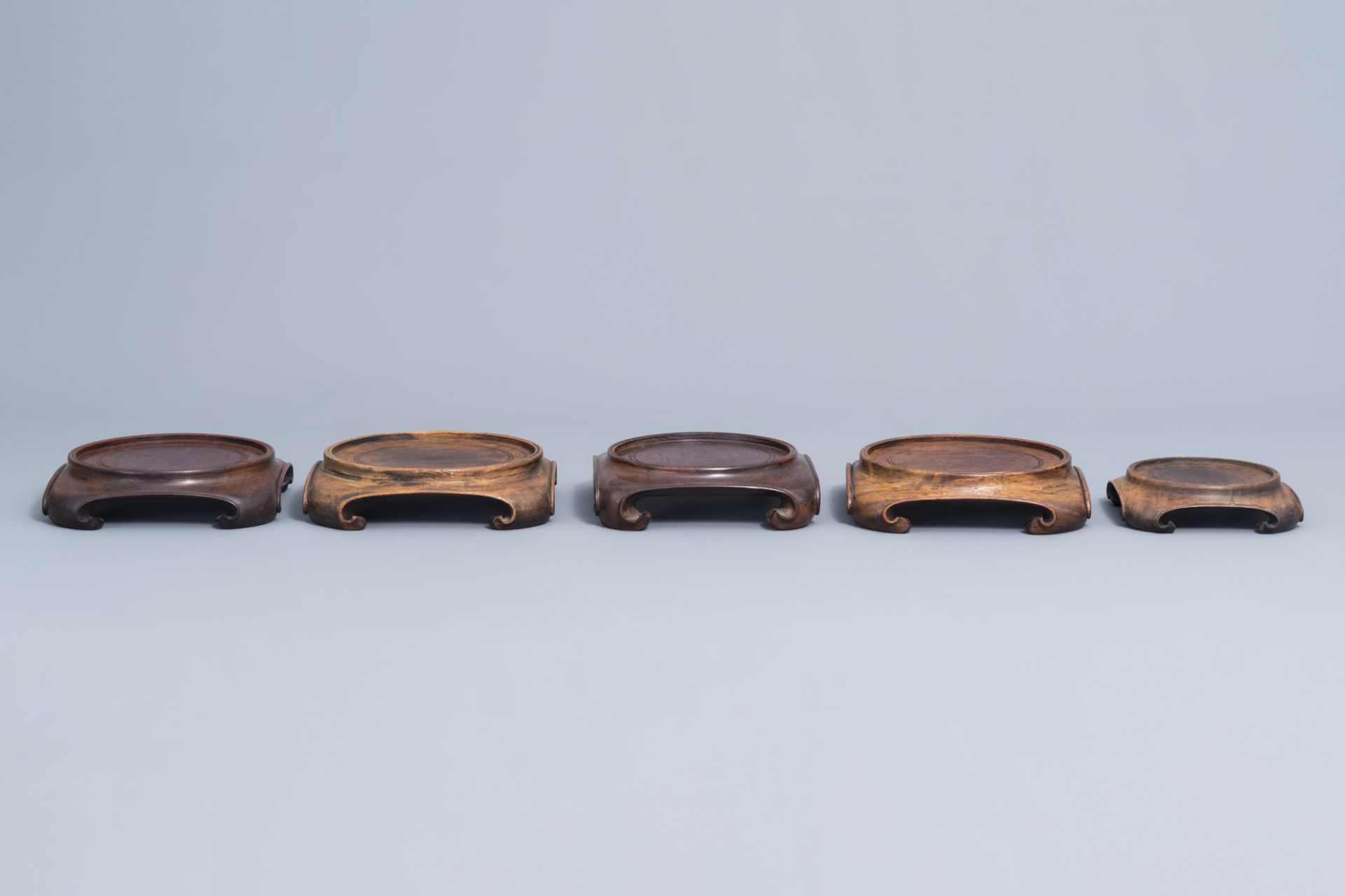 A collection of Chinese wooden stands, 19th/20th C. - Image 4 of 15
