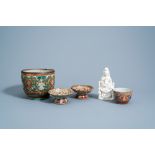 Four Chinese Thai market Bencharong bowls and a blanc de Chine group of Guanyin with children, 18th/