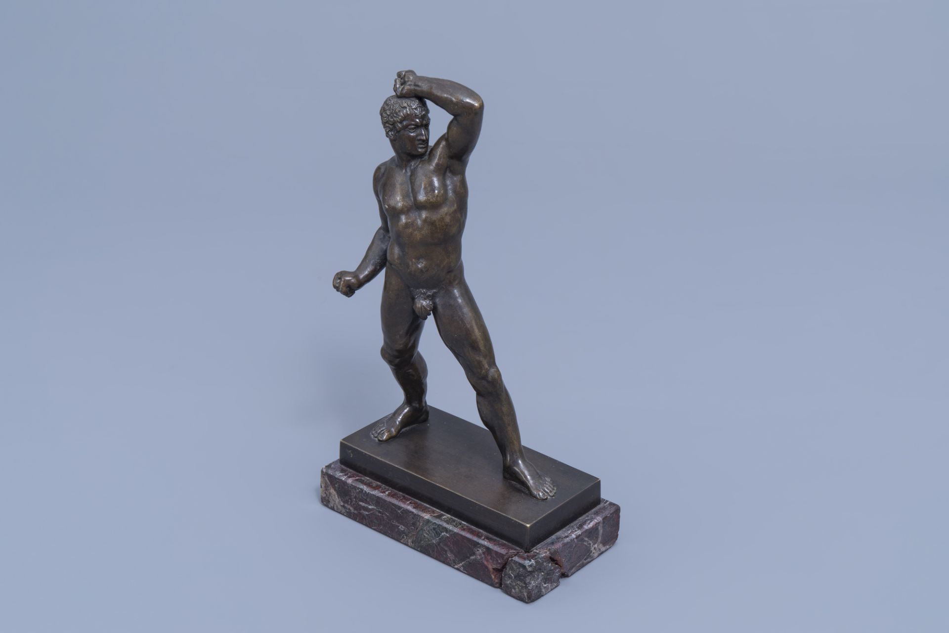 After Antonio Canova (1757-1822): The Greek pugilist or boxer Creugas, patinated bronze on a marble