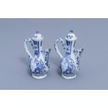 A pair of Chinese blue and white wine jugs with European subject, Kangxi