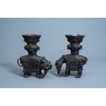 A pair of Chinese bronze elephant vases, Kangxi