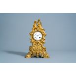 A French gilt bronze mantel clock with bacchantes and the forbidden fruit, 19th C.