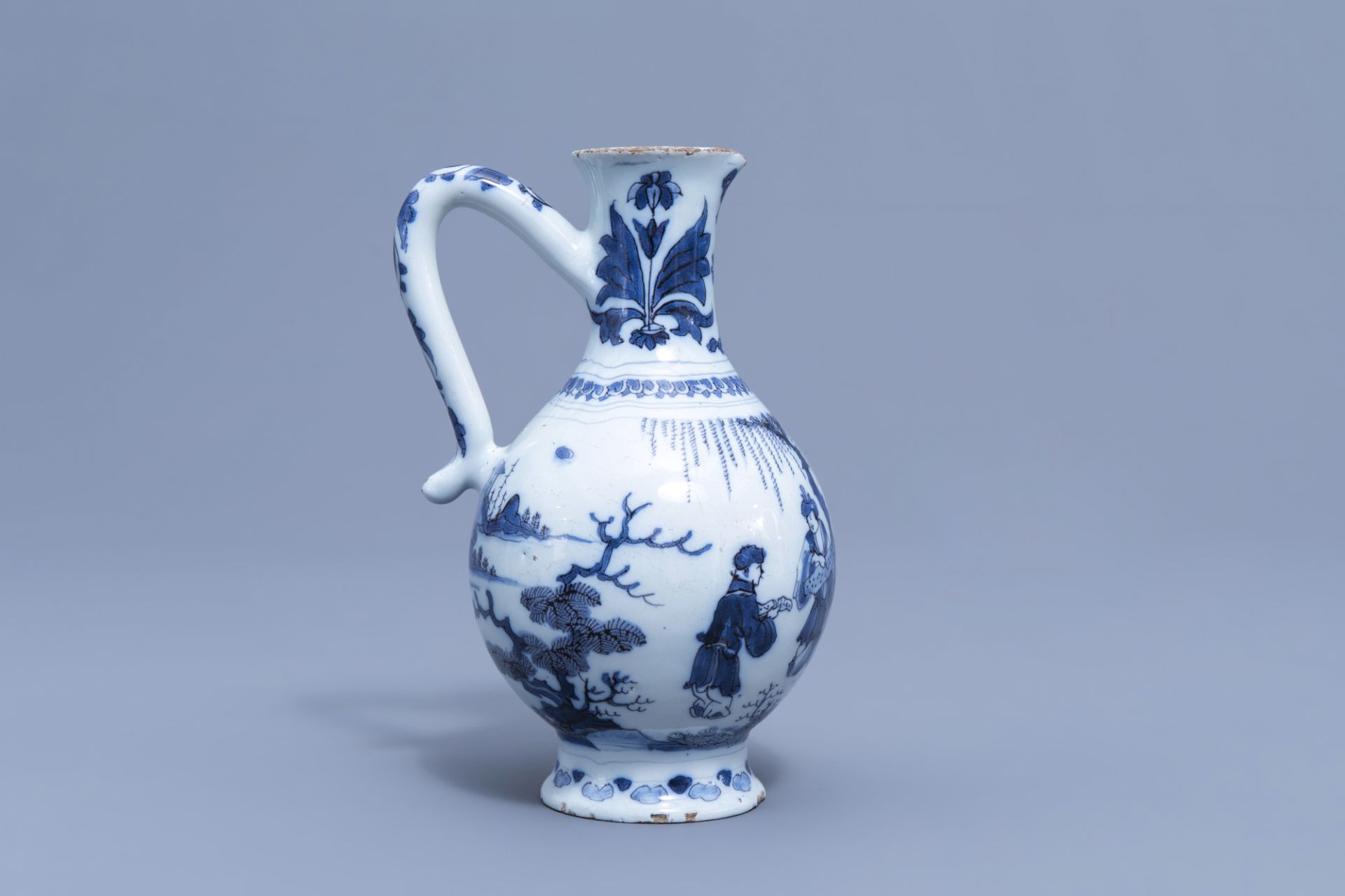 A Dutch Delft blue and white chinoiserie jug, 17th C. - Image 2 of 8