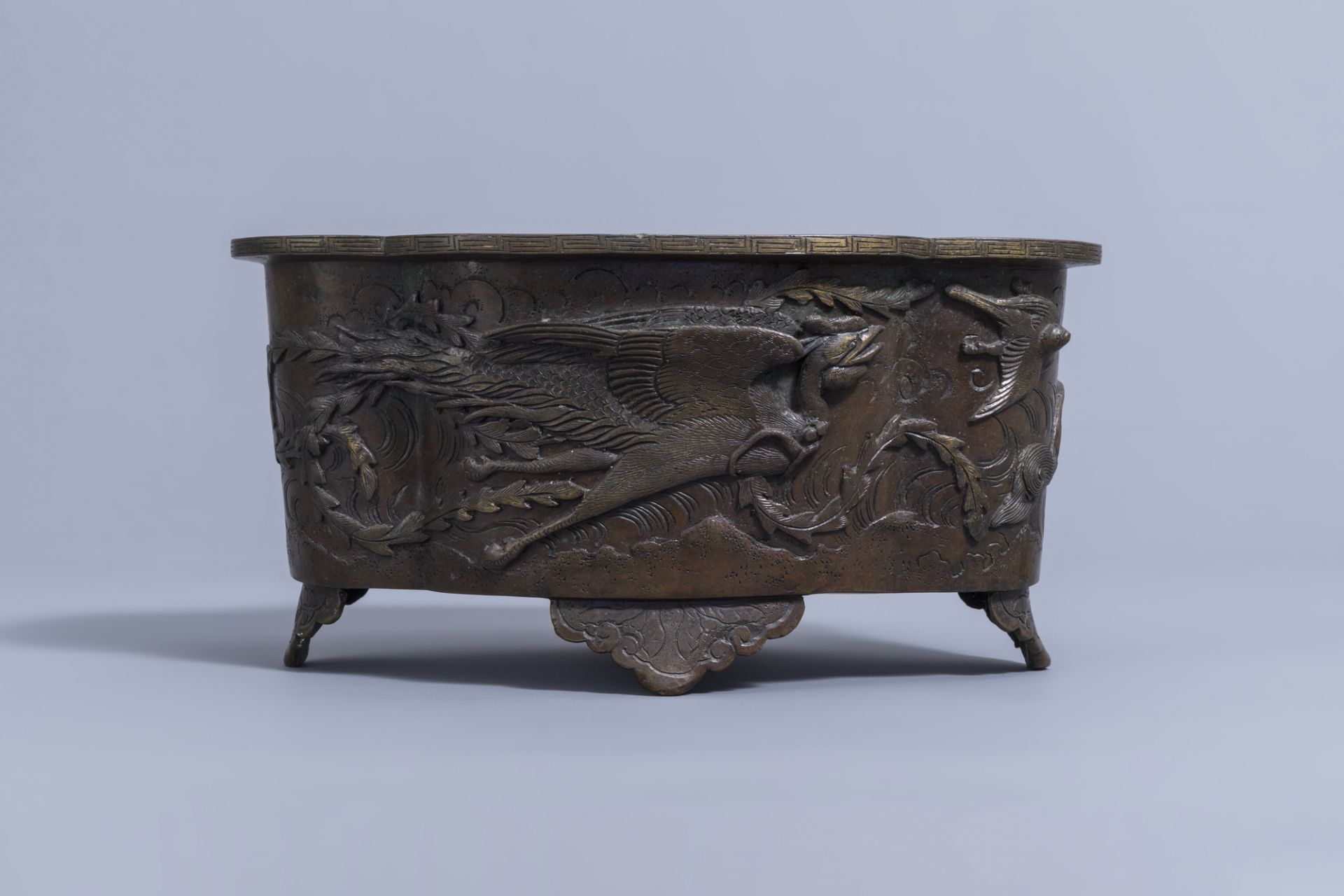 A Japanese four-lobed bronze 'dragon and phoenix' jardiniere, Meiji, 19th C. - Image 3 of 9