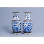 A pair of Chinese blue and white Nanking crackle glazed vases with birds among blossoming branches,