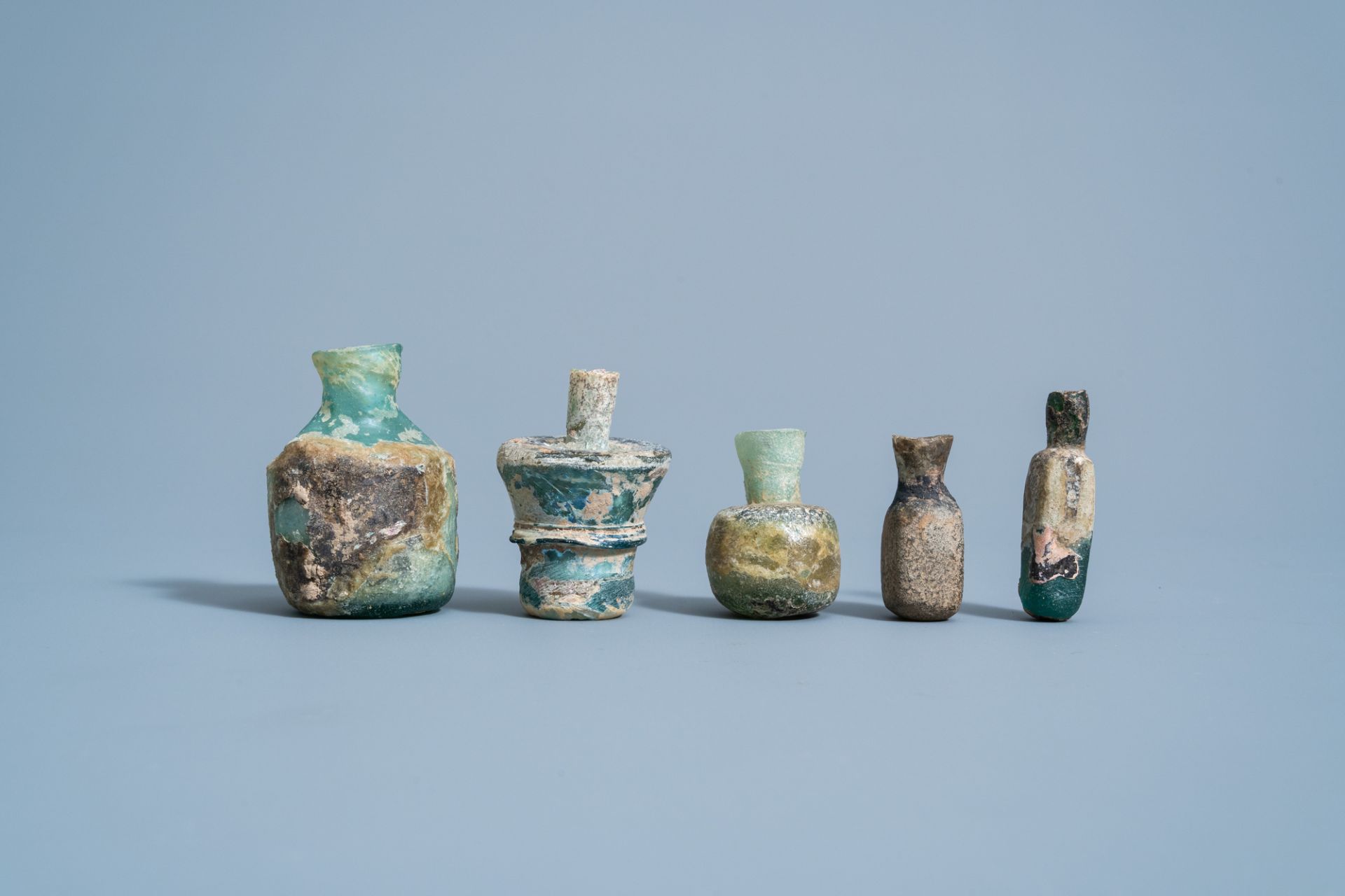 Five various soda glass bottles, jars and flasks, Roman period - Image 2 of 5